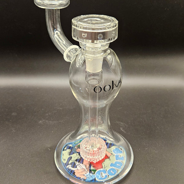 Clear glass water pipe on a white background with green sides