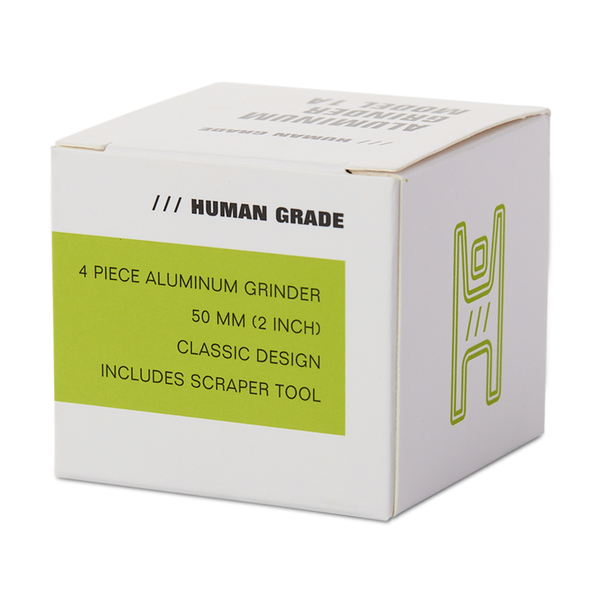 Blue metal grinder with 'Human Grade' branding on a white background