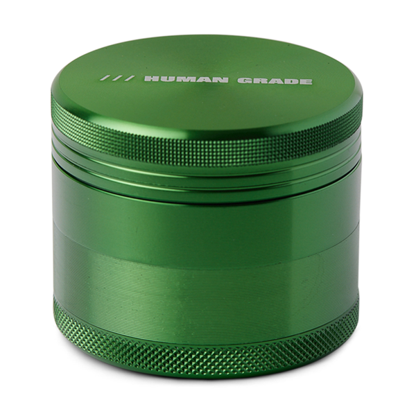 Blue metal grinder with 'Human Grade' branding on a white background