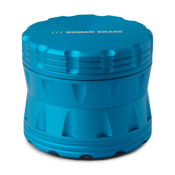 Blue cylindrical container with textured surface on a white background
