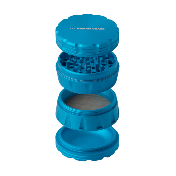 Blue cylindrical container with textured surface on a white background