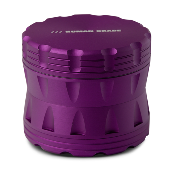 Blue cylindrical container with textured surface on a white background
